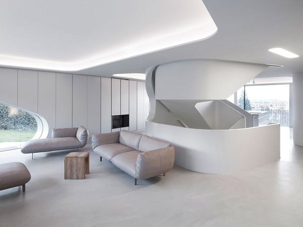Архитектурная студия J. Mayer H. выполнила дизайн современного частного дома OLS на склоне холма в пригороде Штутгарта, Германия.
