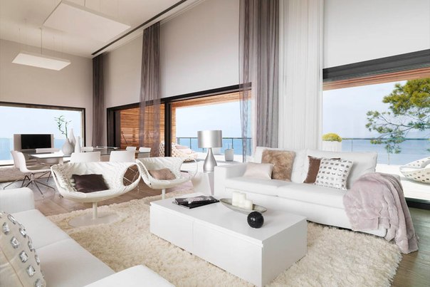 Испанский дизайнер интерьеров Susanna Cots выполнила белоснежный дизайн интерьера современного частного дома в Альмуньекаре, Андалусия, Испания.