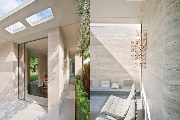 Архитектурная студия De Bever выполнила дизайн современного одноэтажного дома из стекла, бетона и травертина в Эйндховене, Нидерланды. Проект имеет множество округлых стен и окон и выходит на просторный внутренний двор с бассейном.
